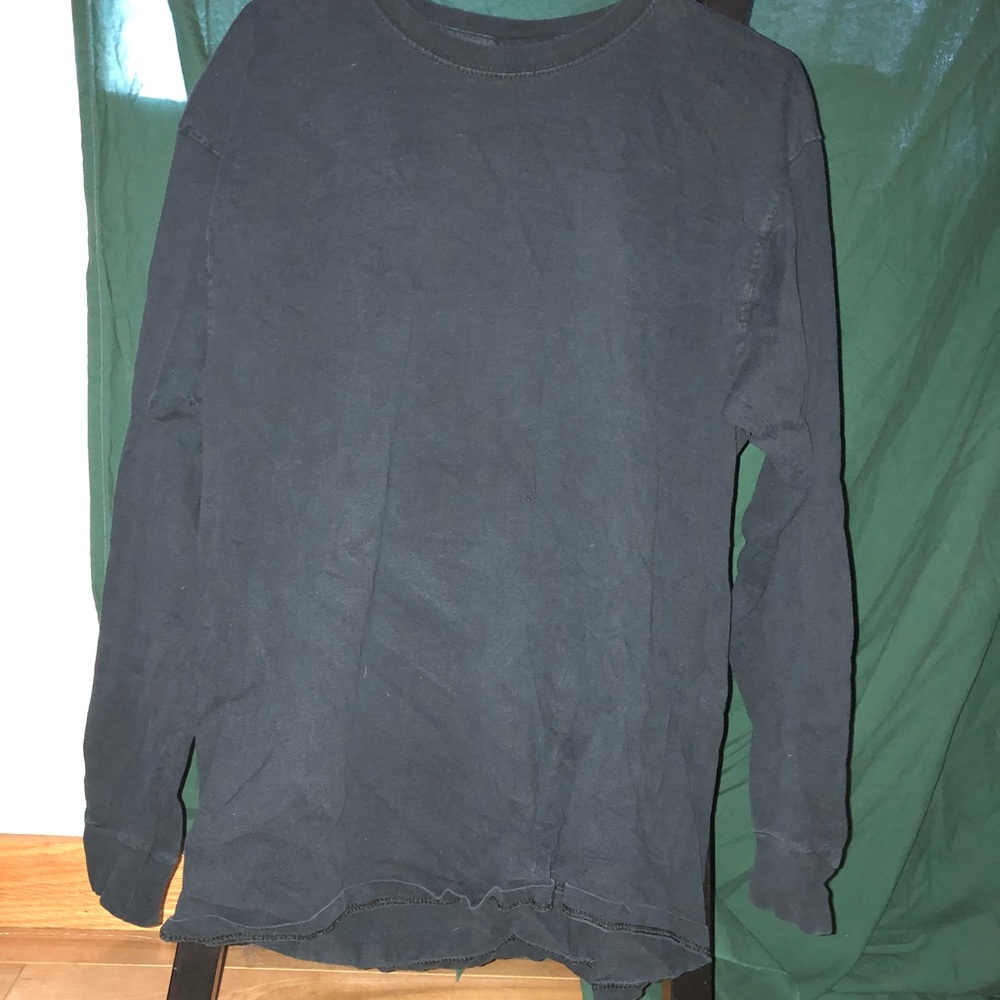 A woman’s black long sleeve